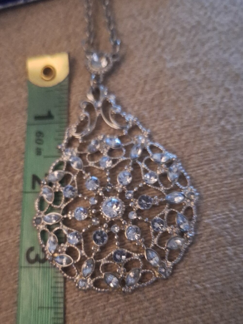 Delicate Silver-Tone Filigree Teardrop Necklace with Clear Stones